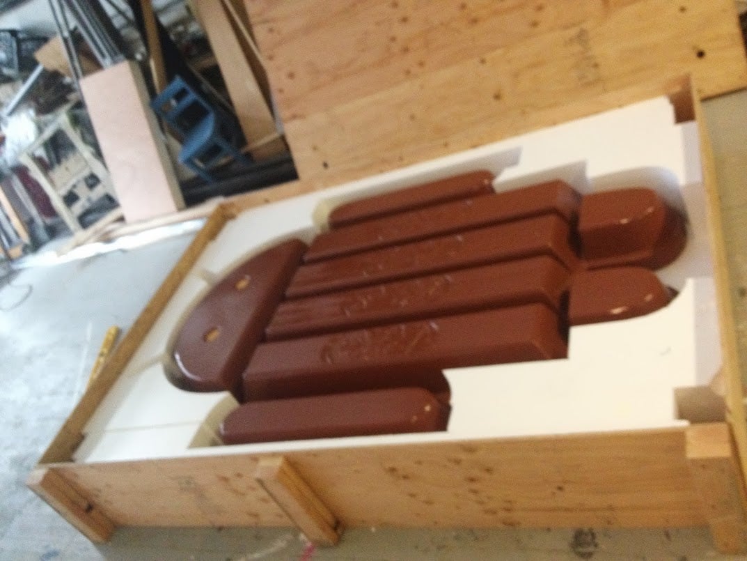 The Bugdroid-shaped KitKat statue in a padded wooden box for shipping