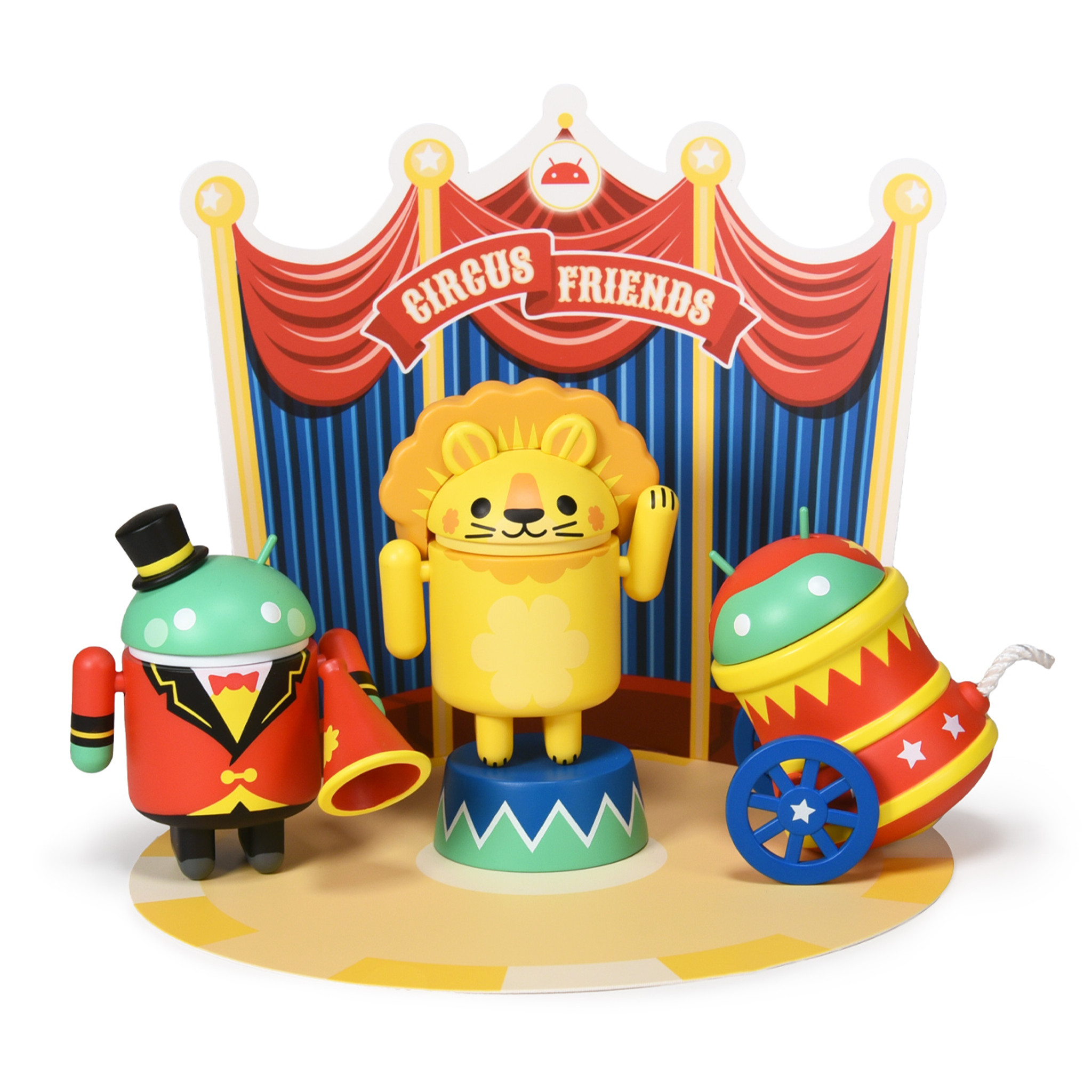 Robot figurines, circus-themed sitting on a circus tent base