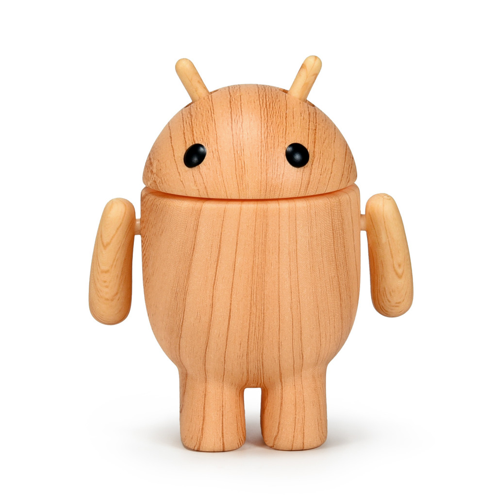 Chibi robot figurine with a wooden print