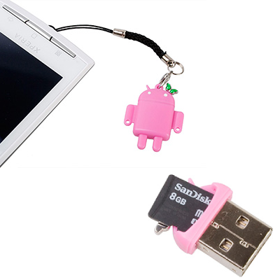 Pink card reader looped on a smartphone. The card reader's backside, showing the card.